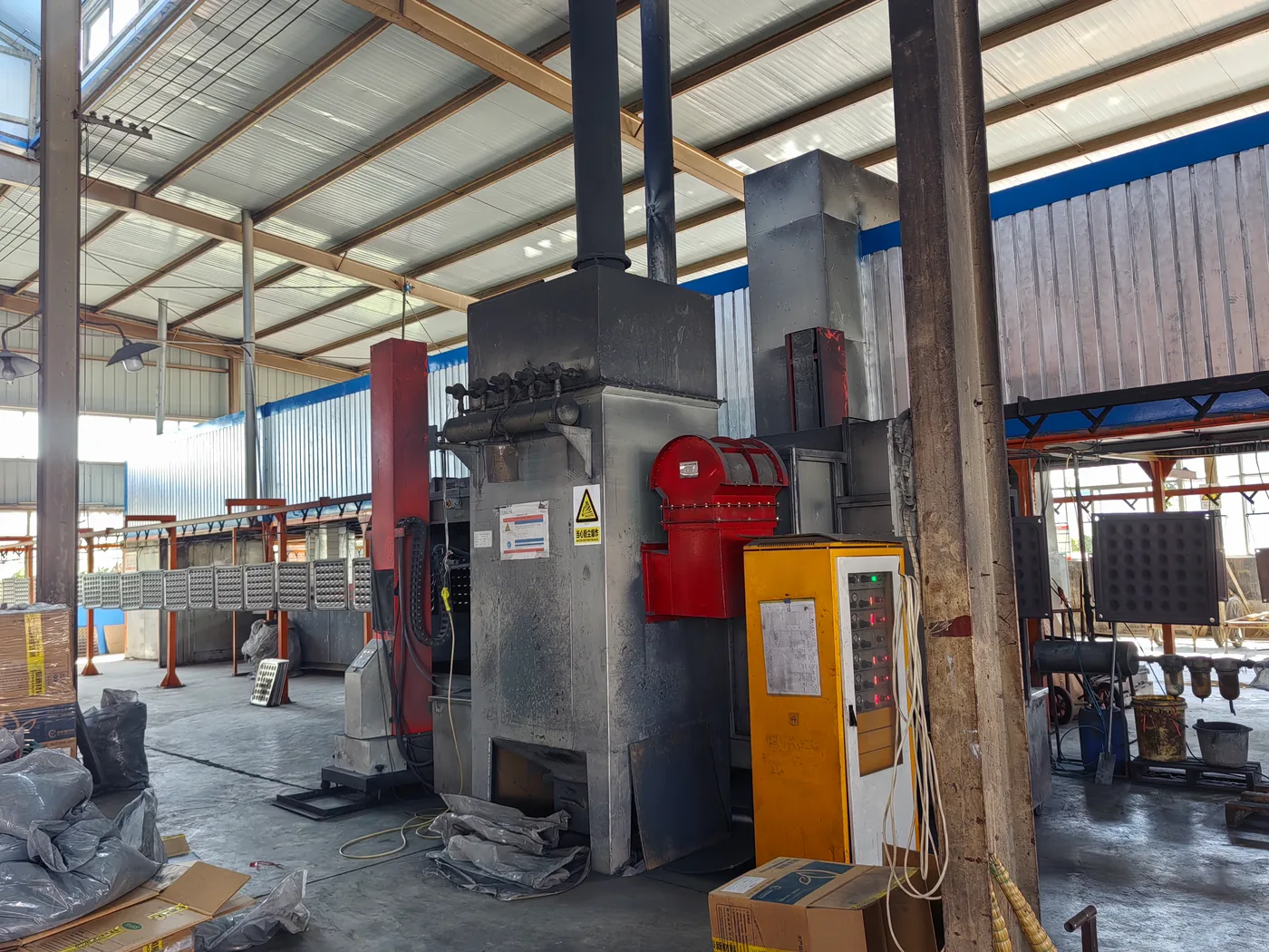 Steel raised floor panels on the powder coating line
